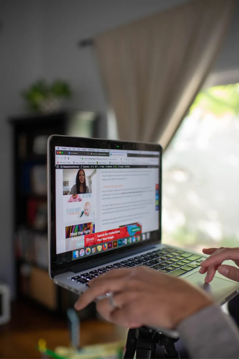Nina working on macbook