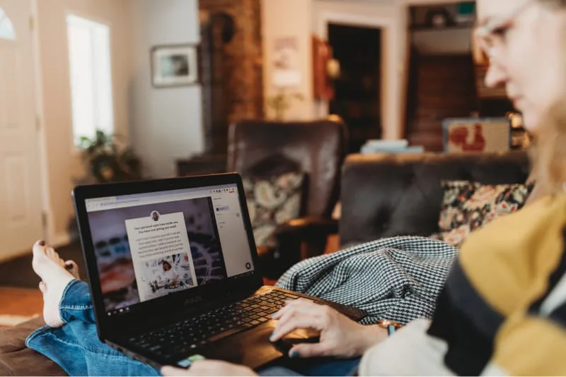 Angela Fehr working on laptop