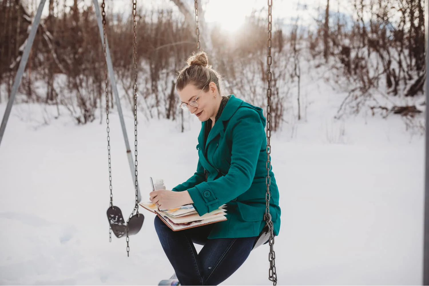 Angela Fehr painting in the snow