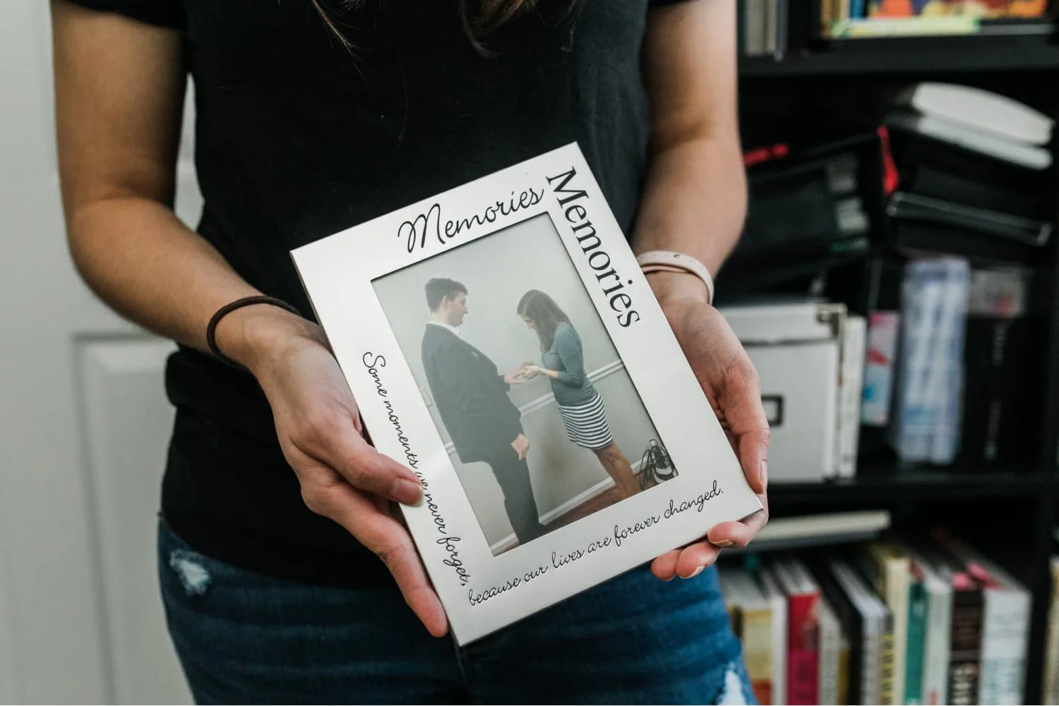 Creator holding photograph