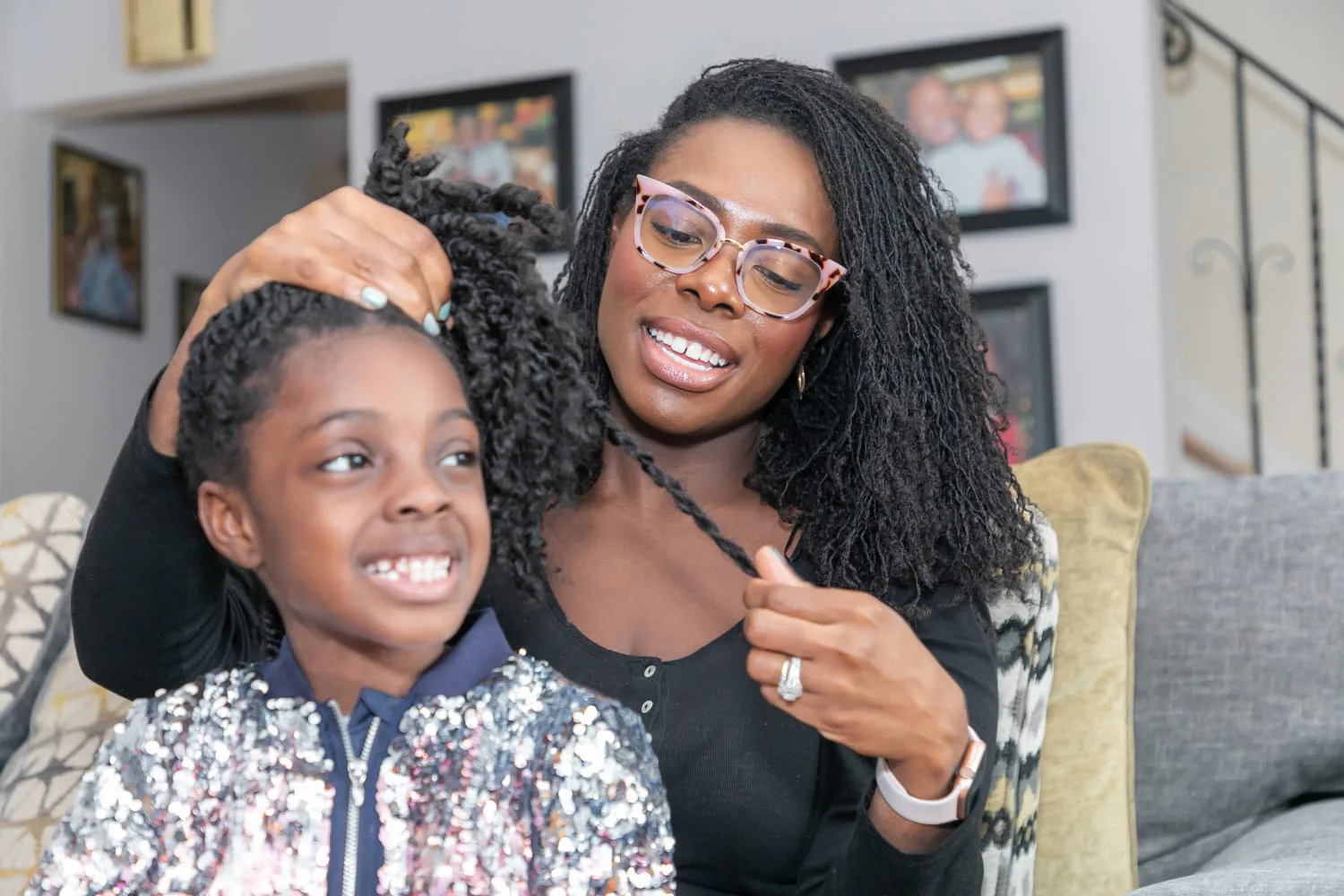 iaac-jenell-stewart-braiding-daughter-hair