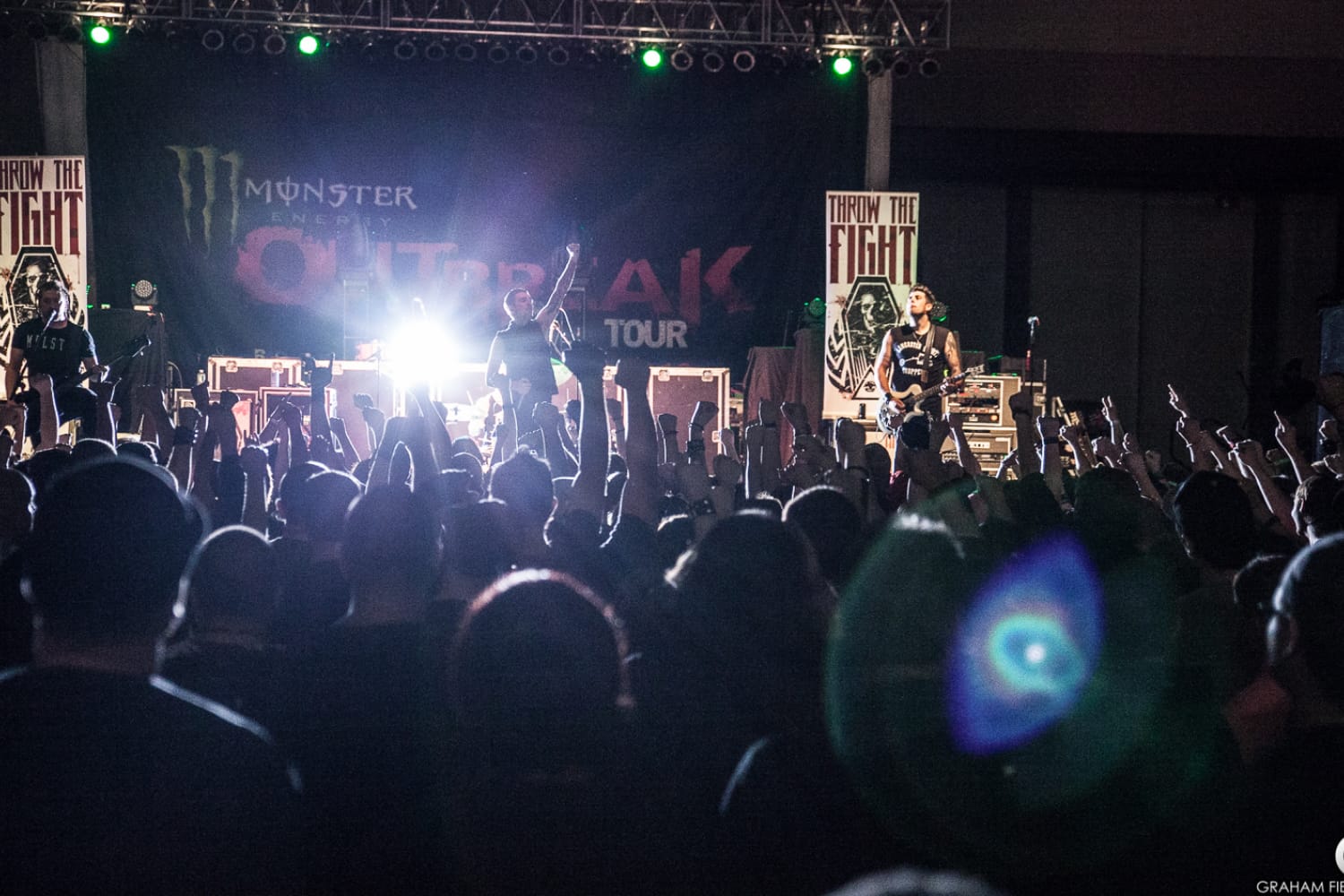 iaac-ryan-baustert-band-on-stage-at-concert-crowd-photo