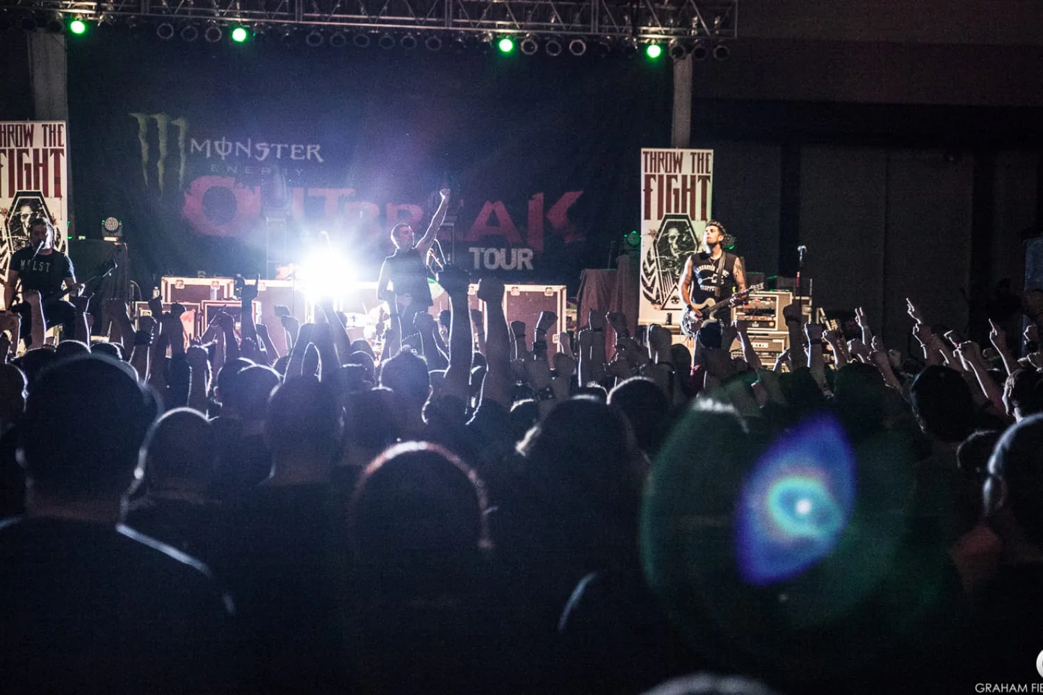 iaac-ryan-baustert-band-on-stage-at-concert-crowd-photo