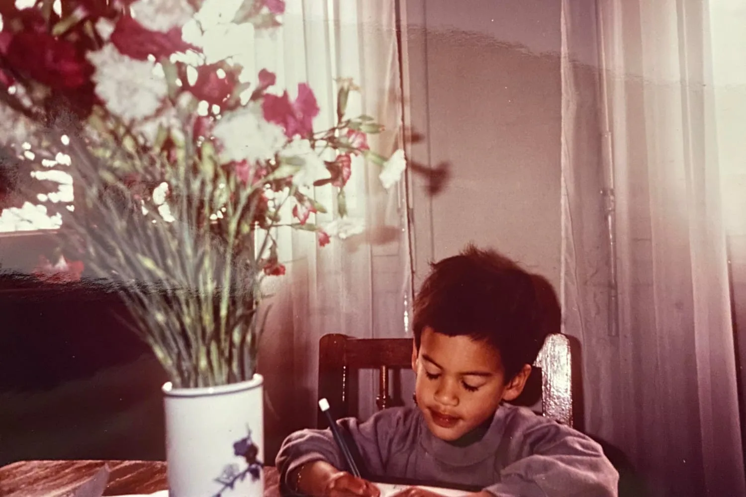 iaac_khe_hy_childhood_writing_at_table