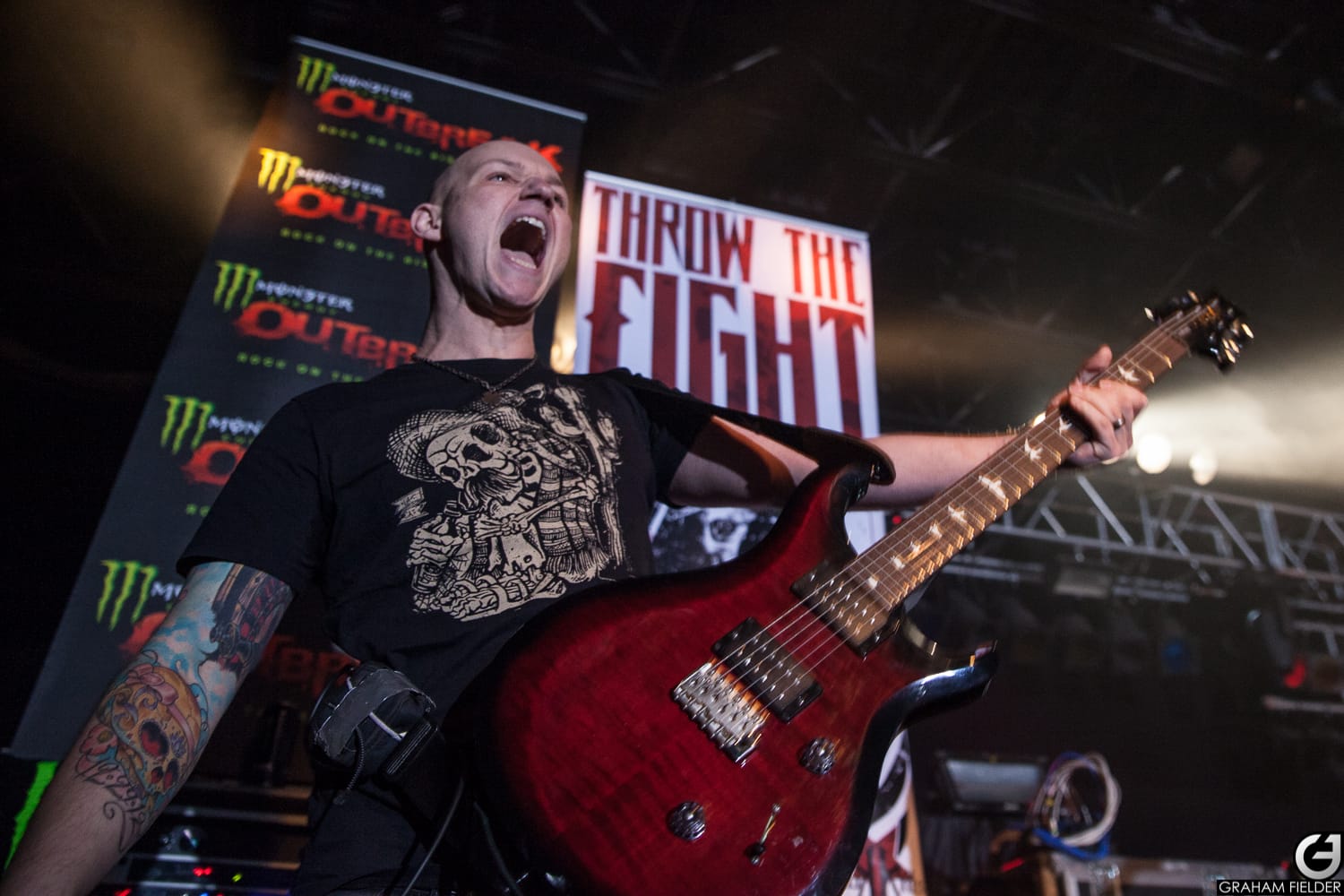 iaac-ryan-baustert-playing-guitar-live-onstage-closeup