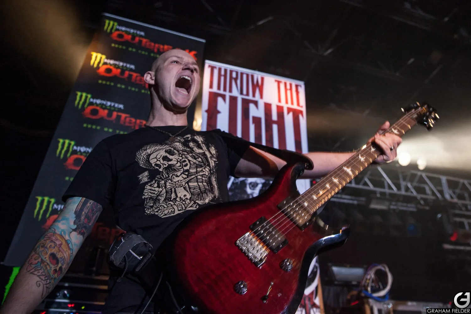 iaac-ryan-baustert-playing-guitar-live-onstage-closeup