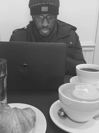 iaac-ed-latimore-writing-on-laptop