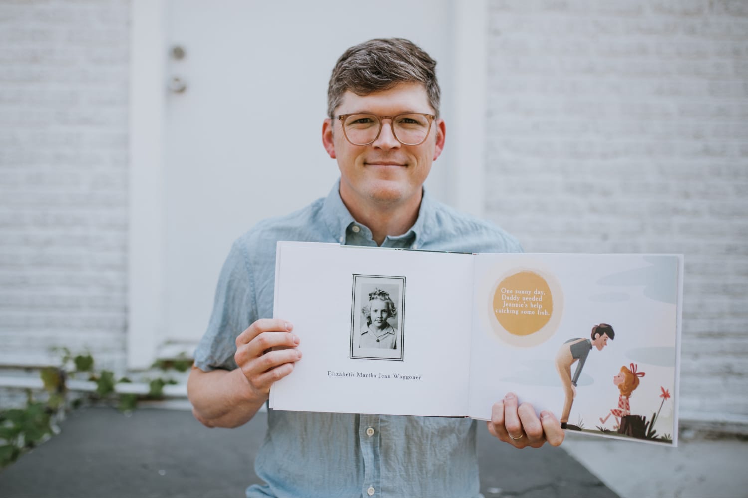 iaac-austin-church-holding-book-with-grandmas-photo