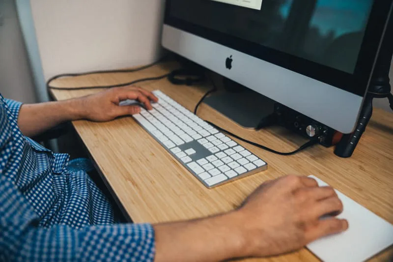iaac-noa-kageyama-working-at-desk-keyboard-typing