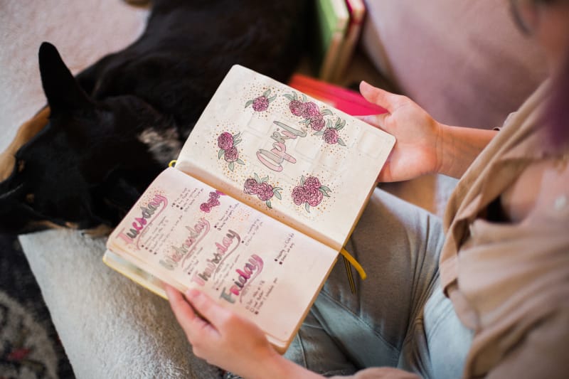 iaac-shelby-abrahamsen-with-dog-and-notebook-art