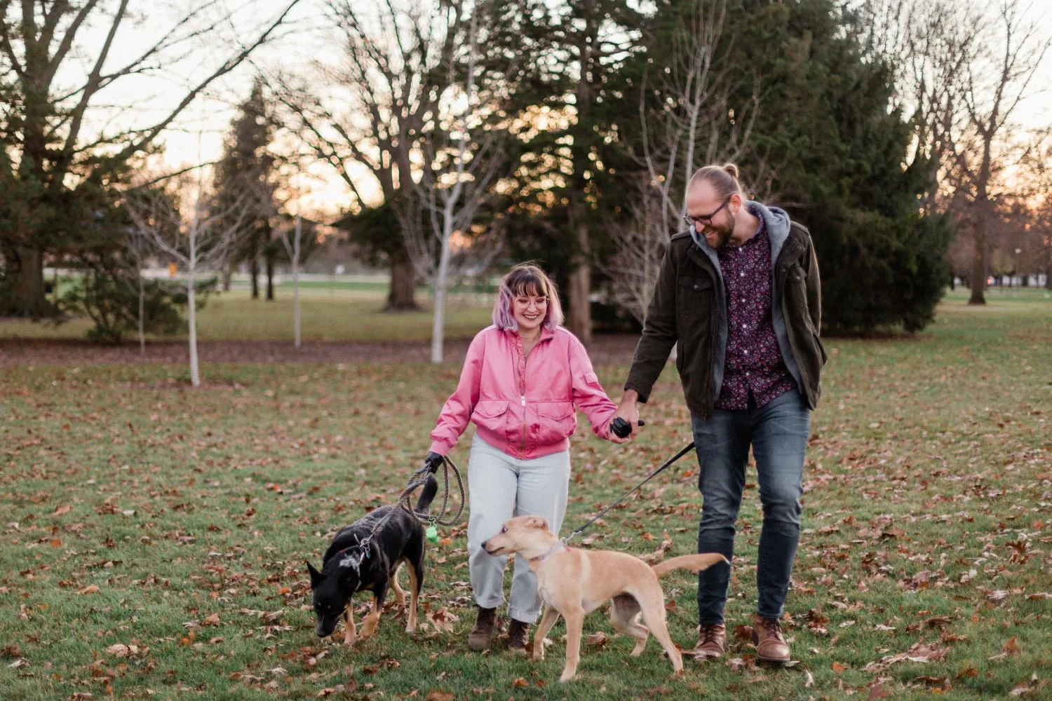 iaac-shelby-abrahamsen-with-dogs-and-husband-at-park