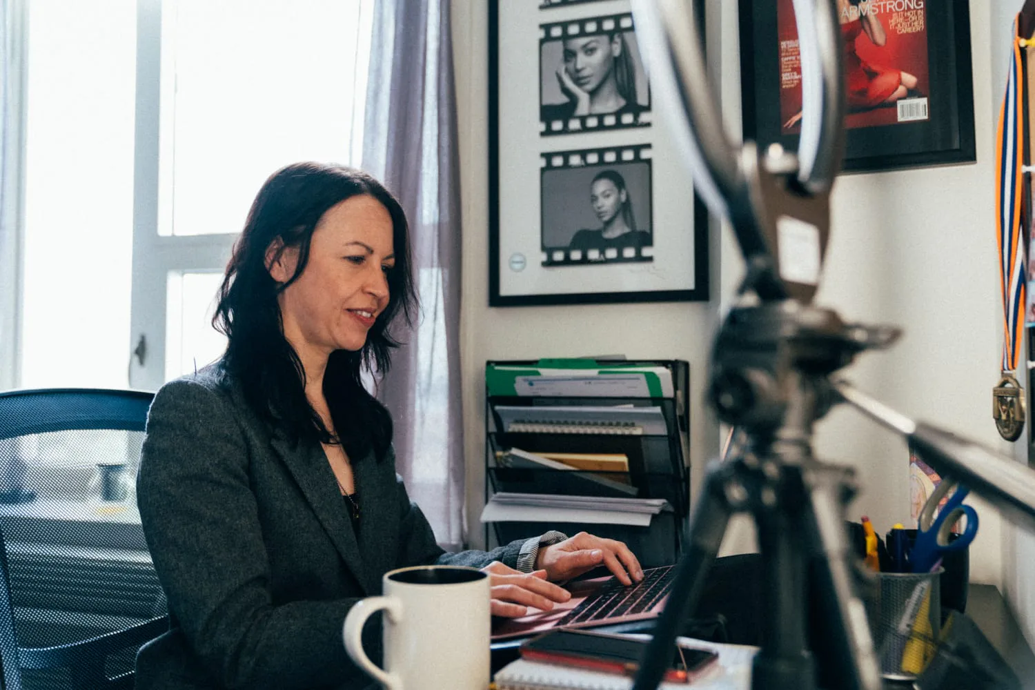 iaac-jennifer-armstrong-typing-at-desk-on-computer