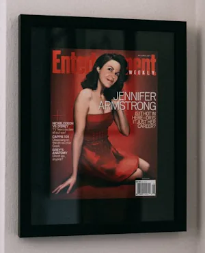iaac-jennifer-armstrong-entertainment-cover-in-frame-on-wall