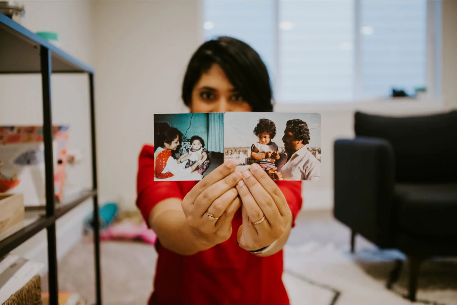 Creator showing photos of family